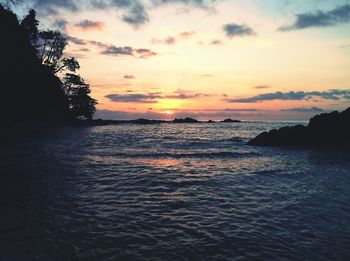 Scenic view of sea at sunset