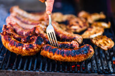 Close-up of meat on barbecue grill