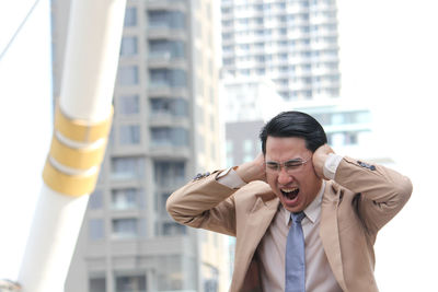 Businessman suffering from headache