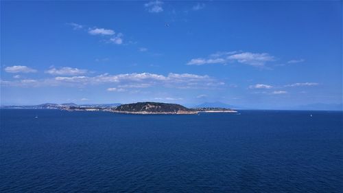 Scenic view of sea against blue sky