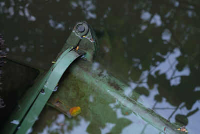 High angle view of  trash in  water by lake