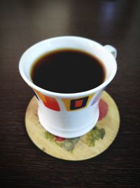 Close-up of tea cup on table