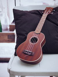 Close-up of guitar at home