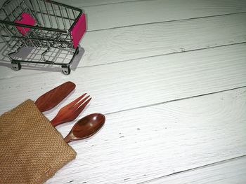 High angle view of tomatoes on wooden table