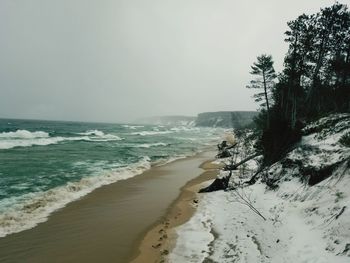 Scenic view of beach against sky