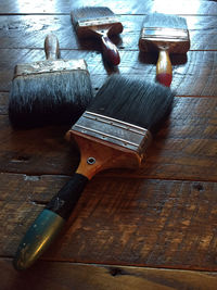 Close-up of paintbrushes on table