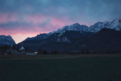 Scenic view of snowcapped mountains against sky
