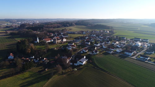 High angle view of agricultural field against clear sky