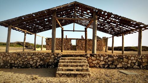 Stack of built structure against clear sky