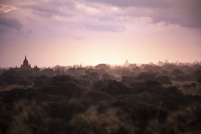 Panoramic view of temple against sky during sunset