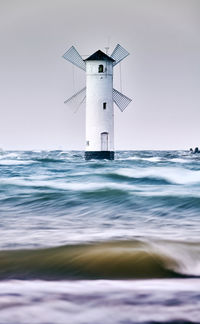 View of lighthouse in sea