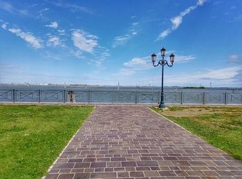 Footpath by sea against sky venezia