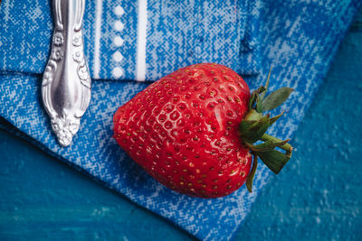 High angle view of strawberries on table