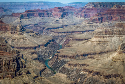 Aerial view of landscape with mountain range in background