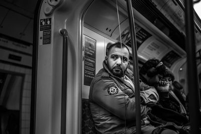 Reflection of man in mirror