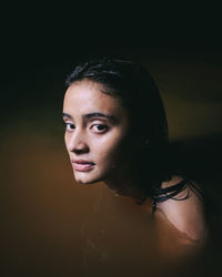 Close-up portrait of young woman