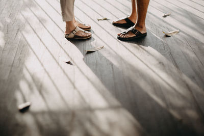 Low section of woman standing on floor