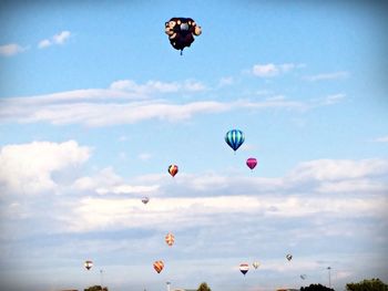 Hot air balloons flying in sky