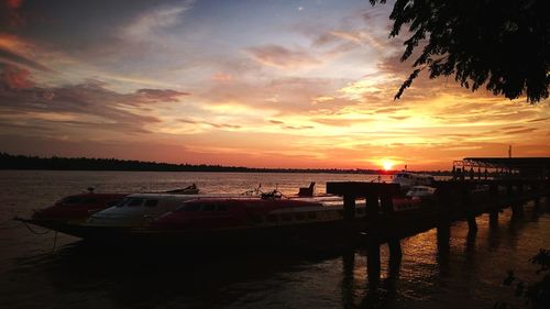 Scenic view of calm sea at sunset