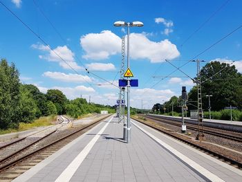 Railroad station platform against sky