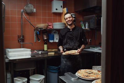 Portrait of young man working at home