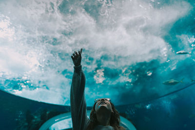 Portrait of woman swimming in sea