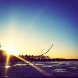 Sun shining through landscape