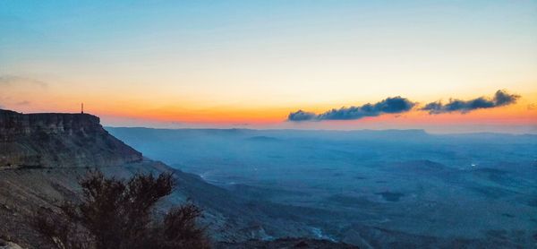 Scenic view of mountain against sky during sunset