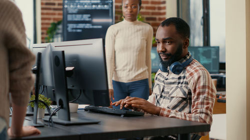 Computer programmer working at office