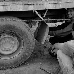 Close-up of man working at construction site