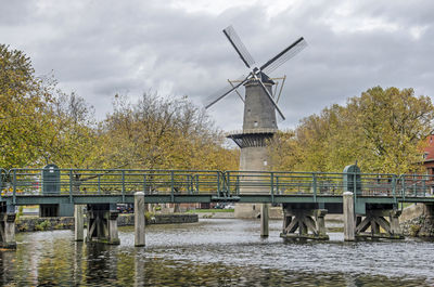 Schiedam bridge, canal, trees and windmill