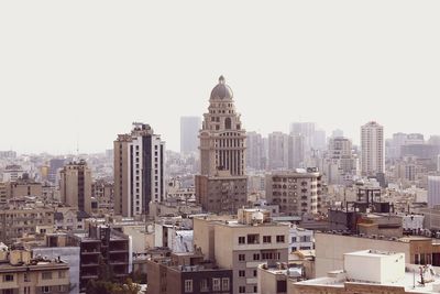 Buildings against clear sky