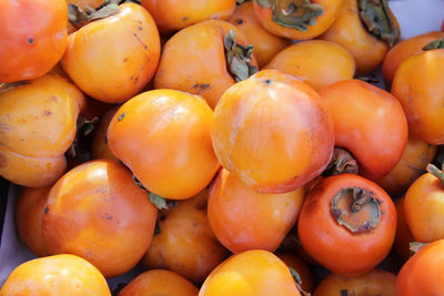 Full frame shot of oranges at market stall