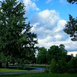 Scenic view of landscape against cloudy sky