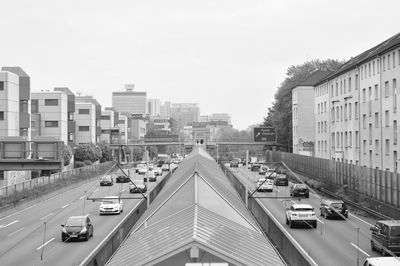 Grayscale shot of the bundesautobahn 40 motorway through the city of essen in germany