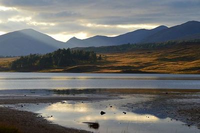 Scenic view of mountains at sunset