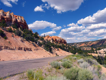 Scenic view of mountains against cloudy sky