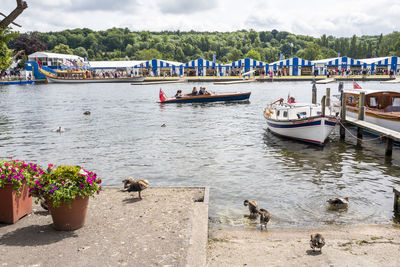 View of boats moored in lake