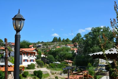 Buildings against blue sky and clouds