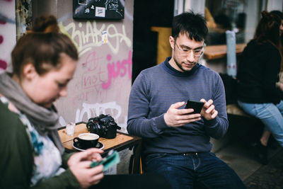 Young man using mobile phone