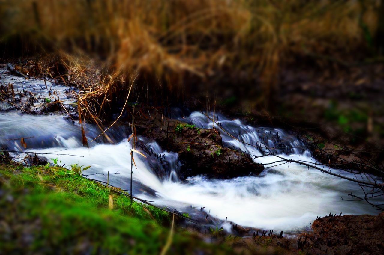 motion, long exposure, flowing water, blurred motion, water, nature, waterfall, beauty in nature, no people, outdoors, river, grass, tranquility, scenics, tranquil scene, speed, moss, day, forest, power in nature, tree