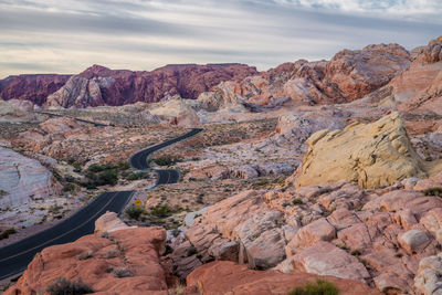 Scenic view of mountain against cloudy sky