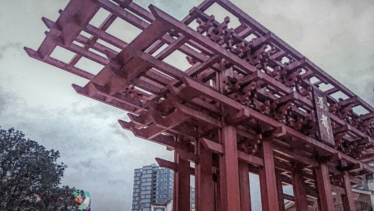 low angle view, architecture, built structure, sky, cloud, cloud - sky, building exterior, day, high section, outdoors, tall - high, cloudy, no people, tall, building story