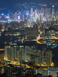 Illuminated modern buildings in city at night