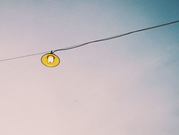 Low angle view of street light against sky