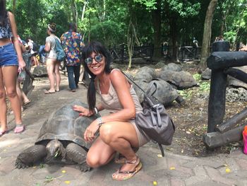 Young couple sitting in park