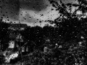 Close-up of water drops on glass