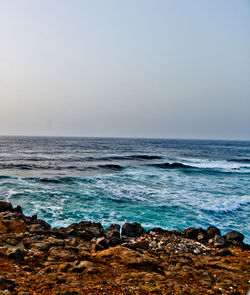 Scenic view of sea against clear sky