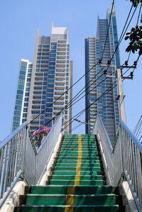 Low angle view of steps leading to modern buildings
