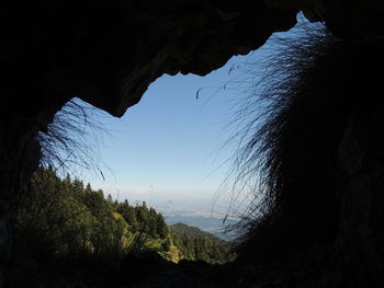 Scenic view of silhouette mountain against sky